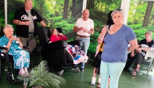 Residents and their visitors enjoying the House of Tranquility