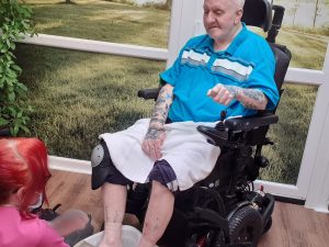 A gentleman at Ash Lodge getting a pedicure